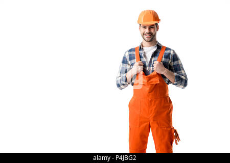 Smiling repairman in orange overall and hard hat isolated on white Stock Photo