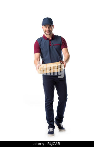 smiling delivery man with cardboard pizza boxes isolated on white Stock Photo