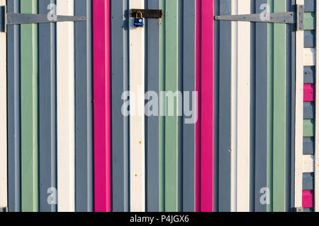 Section of multicoloured wood panelling from a seaside beach hut. Perfect as a background for Summer Holiday or seaside themes. Stock Photo