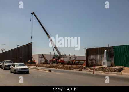 A new bigger fence is erected along the US Mexican border at Calexico ...