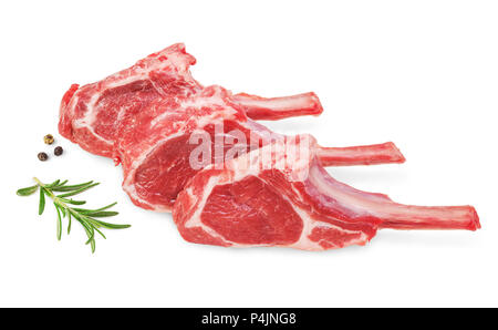 Fresh lamb cutlet  with  rosemary and pepper isolated on white background. Stock Photo
