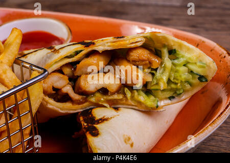 Pork Burrito with French potato Stock Photo