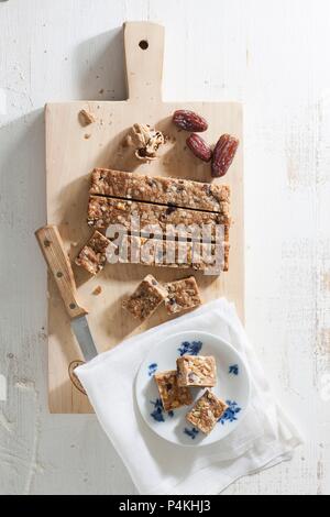 Muesli bars with dates and nuts Stock Photo