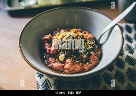 Strawberry oats with cashew nuts and honey Stock Photo