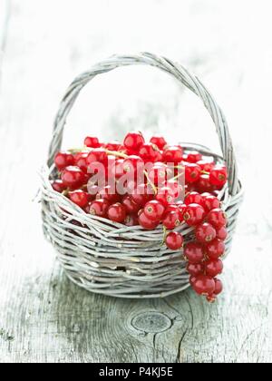 Redcurrants in a basket Stock Photo