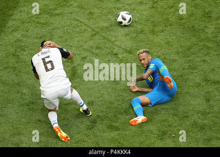 Costa Rica's Oscar Duarte (left) and Brazil's Neymar battle for the ball during the FIFA World Cup Group E match at Saint Petersburg Stadium, Russia. Stock Photo