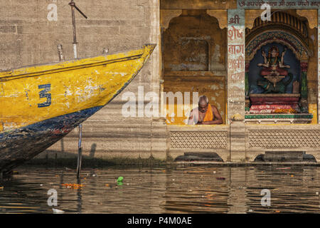 Portrait of unidentified Sadhu (holy man) meditating near a temple Stock Photo