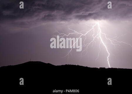 Allariz, Galicia / Spain - Jun 21 2018: lightning strike during a thunderstorm. Stock Photo