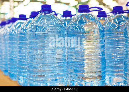 Rows of many transparent plastic bottle with drinking water supply in white  refrigerator. Mineral water stack storage in fridge to drink on hot summer  Stock Photo - Alamy