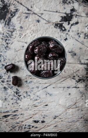 A bowl of dates (seen from above) Stock Photo