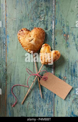 Cherry Pie Pops (small cherry pies on the stick) to give away Stock Photo