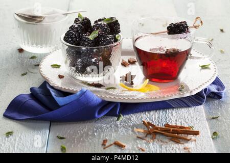 Mulled wine with blackberries Stock Photo