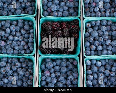 Blueberries and blackberries at a farmers market Stock Photo