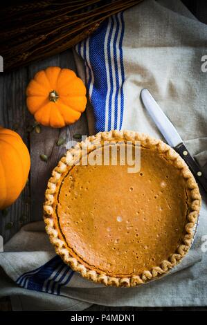 A whole pumpkin pie (seen from above) Stock Photo