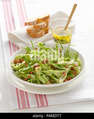 Chicory salad with bacon Stock Photo