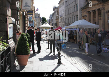 People shopping at Saint Nicholas Market in Bristol, England. Stock Photo