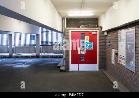 Doors to the stairs inside Manors multi storey car park in Newcastle upon Tyne Stock Photo