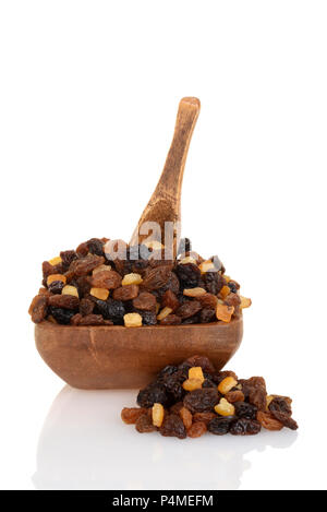 raisins with mixed candied peel in wood bowl with spoon Stock Photo