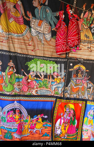 Display of paintings on a cloth at Johari Bazaar in Jaipur, India. Jaipur is the capital and the biggest city of Rajasthan. Stock Photo