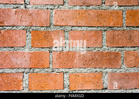 brick wall structure orange with grey lines Stock Photo