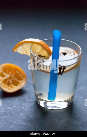 Lemonade in a glass with orange slices Stock Photo