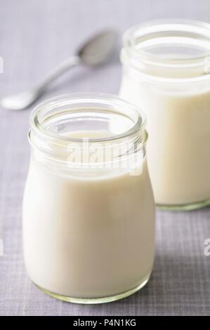 Natural yoghurt in a jar Stock Photo