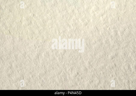 Texture of thick paper intended for watercolor painting. Macro snapshot of  details of the relief paper structure Stock Photo