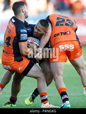 Willie Isa of Wigan Warriors is tackled by Lachlan Lam of Leigh ...