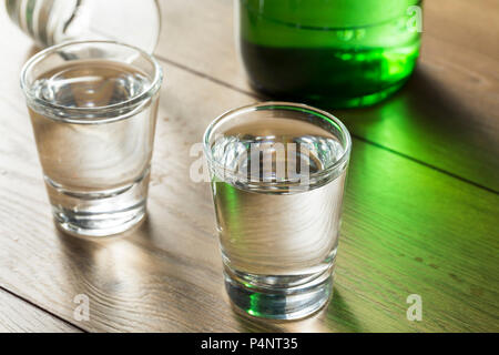 Alcoholic Clear Distilled Korean Soju in a Shot Glass Stock Photo