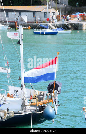 Weymouth, Dorset. 22nd June 2018. A French-registered yacht flies the 'Tricolore' in sunny Weymouth harbour Credit: stuart fretwell/Alamy Live News Stock Photo