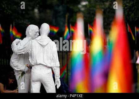 New York, New York, USA. 22nd June, 2018. Statues at Stonewall National Monument in New York City's Greenwich Village commemorate where the Pride movement was born, following a series of demonstrations in response to a police raid of the Stonewall Inn bar in 1969.  The monument is ringed with rainbow flags as Pride events get underway in New York City this weekend, including this Sunday's Pride march. Credit: Adam Stoltman/Alamy Live News Stock Photo