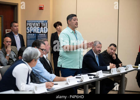 Jose Gonzales, field supervisor for the Department of Health & Human Services' Office of  Refugee Resettlement, speaks as federal and Texas officials and stakeholders meet in a round-table discussion of the immigration crisis hitting the Texas-Mexico border as confusion reigned regarding reuniting of separated parents and children. Stock Photo