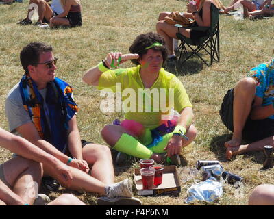 Newport, UK. 23rd June 2018. Festival-goers in fancy dress enjoy the sunshine at Isle of Wight Festival. Credit: amylaura/Alamy Live News Stock Photo