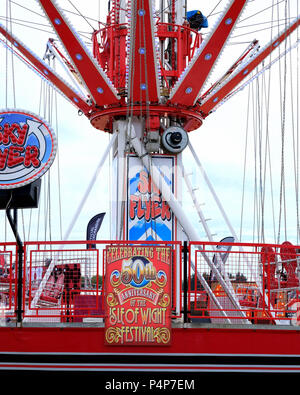 Newport, UK. 23rd June 2018. Fairground ride sign celebrating IOW ...