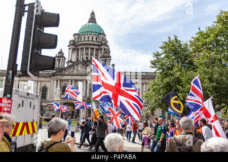 Belfast City Hall, Belfast, Northern Ireland. 23rd June 2018. Hundreds attend both UK Freedom March and a counter United Against Racism protests. there was heavy Police Presence when rival group faced each other across a police divide. Credit: Bonzo/Alamy Live News Stock Photo