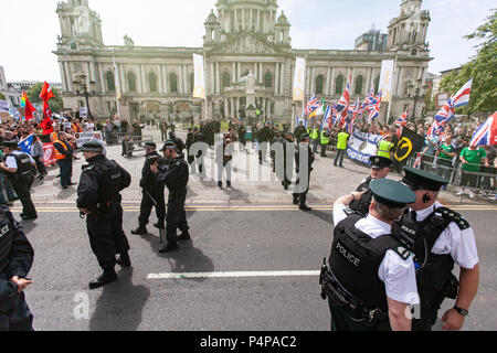 Belfast City Hall, Belfast, Northern Ireland. 23rd June 2018. Hundreds attend both UK Freedom March and a counter United Against Racism protests. there was heavy Police Presence when rival group faced each other across a police divide. Credit: Bonzo/Alamy Live News Stock Photo