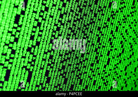 Macro of password selection on the monitor of the office computer. The concept of hacking the protection of a personal data keeper. The stream of supp Stock Photo
