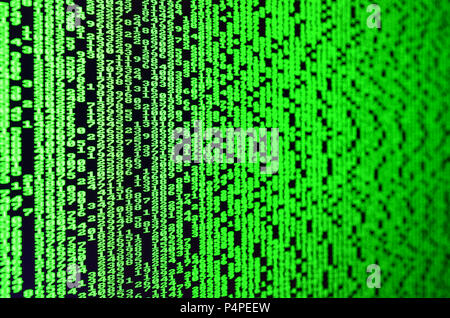 Macro of password selection on the monitor of the office computer. The concept of hacking the protection of a personal data keeper. The stream of supp Stock Photo