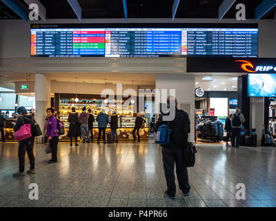 Flight information on screen in departure hall of Melbourne Airport. Victoria, Australia. Stock Photo