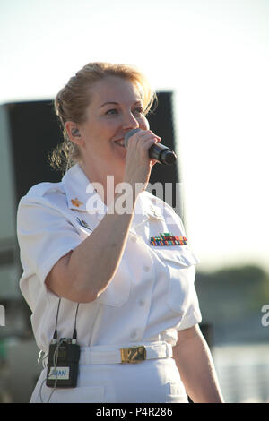 WASHINGTON, D.C. (May 11, 2012) The Navy Band Cruisers performed an evening concert at The Yards Park along the Anacostia River waterfront in Washington, DC. The Cruisers are the Navy's premier contemporary music ensemble. Stock Photo