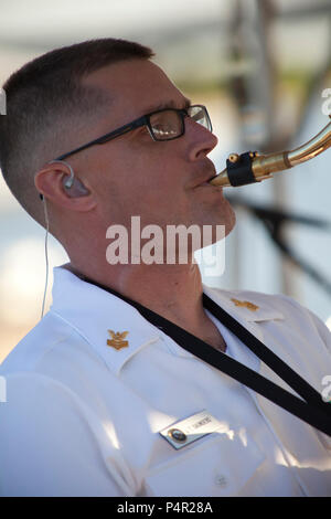 WASHINGTON, D.C. (May 11, 2012) The Navy Band Cruisers performed an evening concert at The Yards Park along the Anacostia River waterfront in Washington, DC. The Cruisers are the Navy's premier contemporary music ensemble. Stock Photo