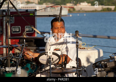 WASHINGTON, D.C. (May 11, 2012) The Navy Band Cruisers performed an evening concert at The Yards Park along the Anacostia River waterfront in Washington, DC. The Cruisers are the Navy's premier contemporary music ensemble. Stock Photo