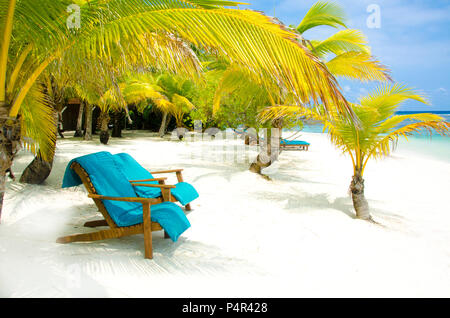 South Water Caye in Belize - small caribbean paradise island with tropical beach for vacation and relaxing Stock Photo