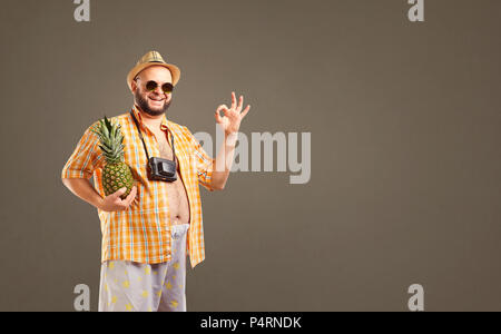 Funny fat man in hat smiling in summer. Stock Photo