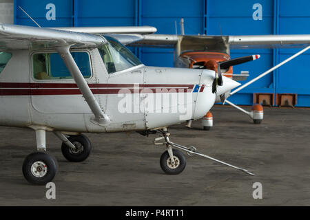 Small Sport Aircraft parked in hangar, close up. detail Stock Photo