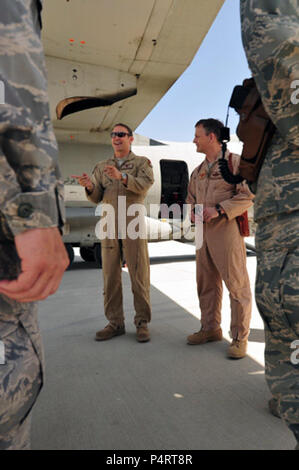 KABUL, Afghanistan – Brig. Gen. Michael Boera, Commanding General, Air Expeditionary Wing, left, talks with Maj. Gen. John Hesterman, Deputy Director, Politico-Military Affairs for Europe, NATO, Russia and Africa about the C-27 Spartan Transport program and training held at the Afghan National Army Air Corps base in Kabul, Afghanistan on May 11, 2010. (US Navy Stock Photo