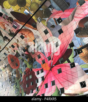 The colourful painted arch ceiling of the Markthal,  famous market hall in central Rotterdam Stock Photo