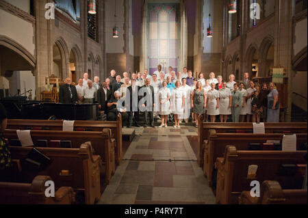 Washington, DC  (August 21, 2011)  -- Members of the U.S. Navy Band Sea Chanters past and present joined forces in a gala concert at Metropolitan Memorial United Methodist Church.  The performance was the climax of the celebration of the Sea Chanters 50th anniversary.  The U.S. Navy Band in Washington, D.C. is the Navy's permiere musical organization and performs public concerts and military ceremonies in the greater Washington area and beyond. Stock Photo