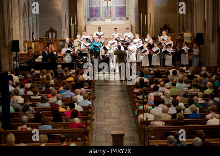 Washington, DC  (August 21, 2011)  -- Members of the U.S. Navy Band Sea Chanters past and present joined forces in a gala concert at Metropolitan Memorial United Methodist Church.  The performance was the climax of the celebration of the Sea Chanters 50th anniversary.  The U.S. Navy Band in Washington, D.C. is the Navy's permiere musical organization and performs public concerts and military ceremonies in the greater Washington area and beyond. Stock Photo