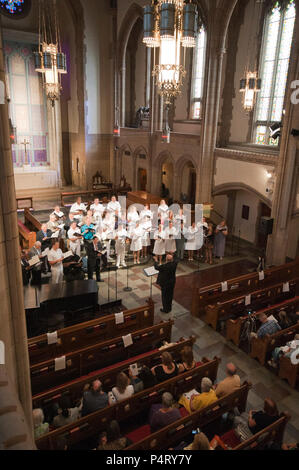 Washington, DC  (August 21, 2011)  -- Members of the U.S. Navy Band Sea Chanters past and present joined forces in a gala concert at Metropolitan Memorial United Methodist Church.  The performance was the climax of the celebration of the Sea Chanters 50th anniversary.  The U.S. Navy Band in Washington, D.C. is the Navy's permiere musical organization and performs public concerts and military ceremonies in the greater Washington area and beyond. Stock Photo